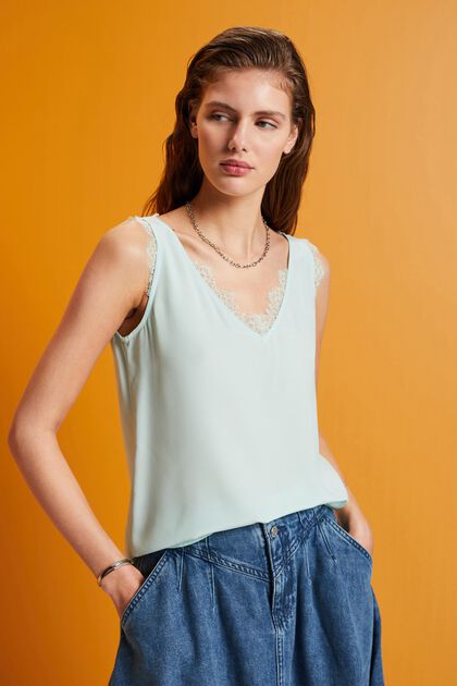 Sleeveless blouse with lace trimming