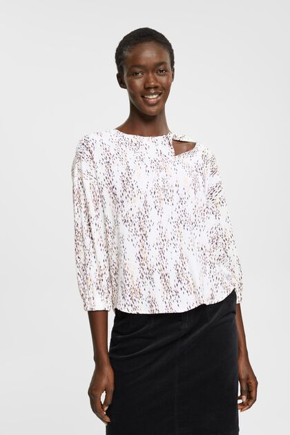 Patterned blouse with cut-out