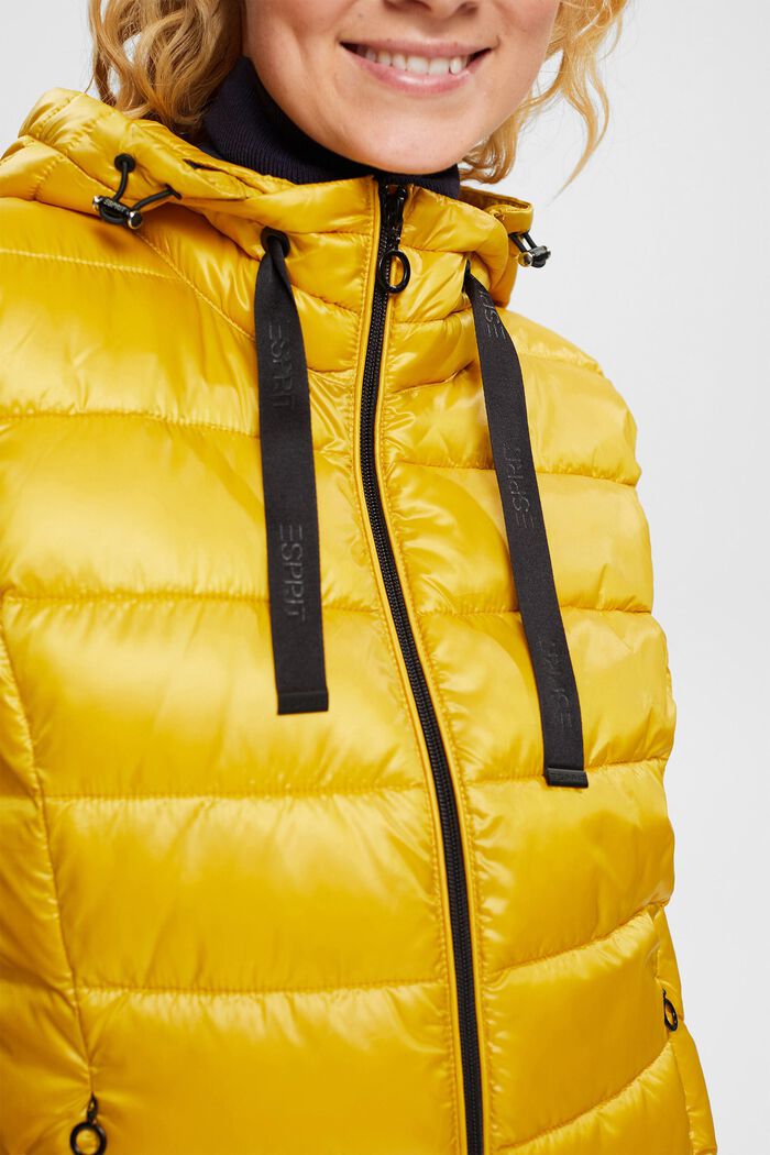 Made of recycled material: quilted body warmer with detachable hood, DUSTY YELLOW, detail image number 0