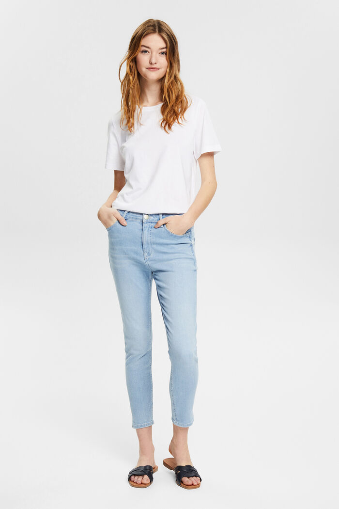 High-rise jeans with hem slits