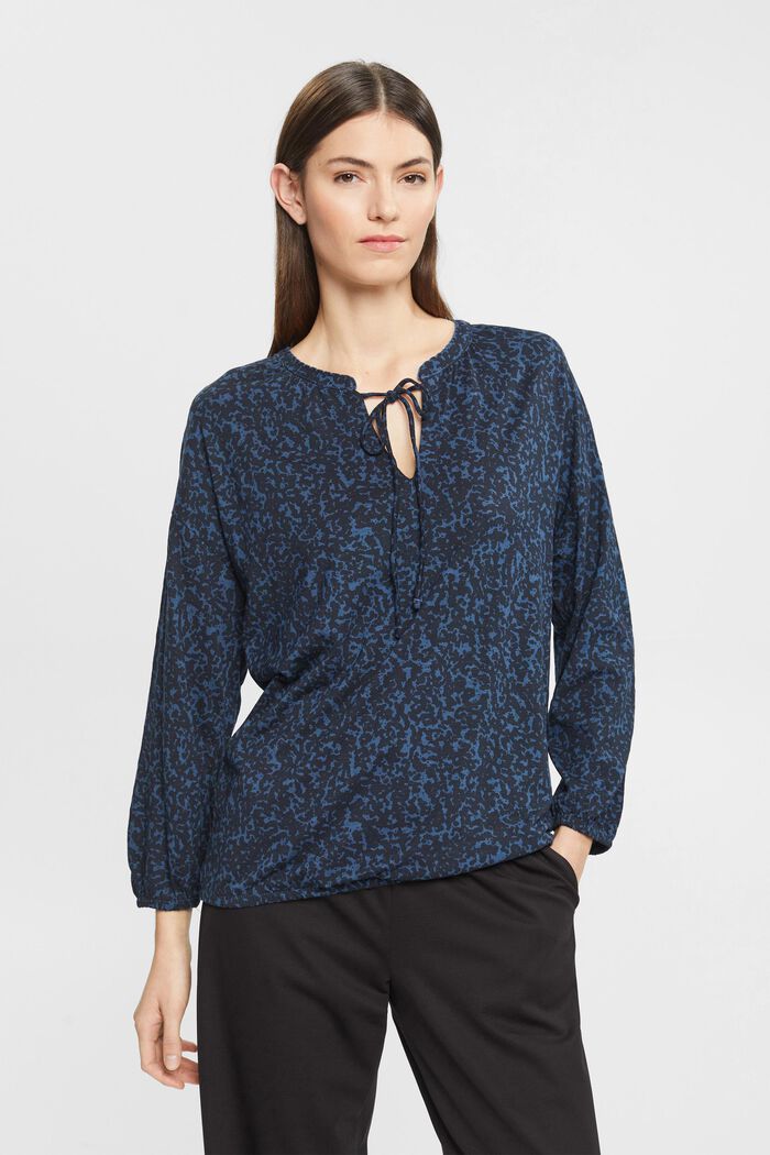 Patterned long-sleeved top with tie detail
