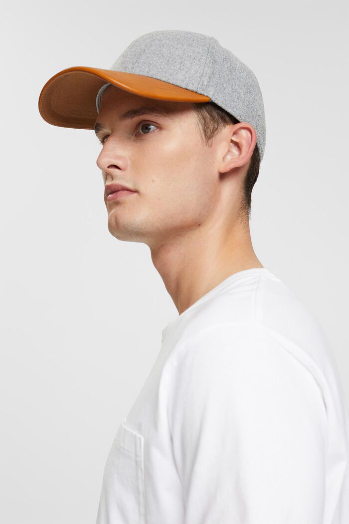 Felt baseball cap with faux leather visor