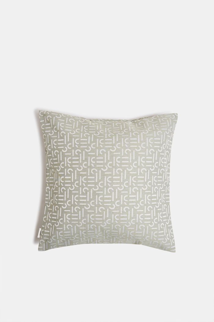 Cushion cover with a woven pattern