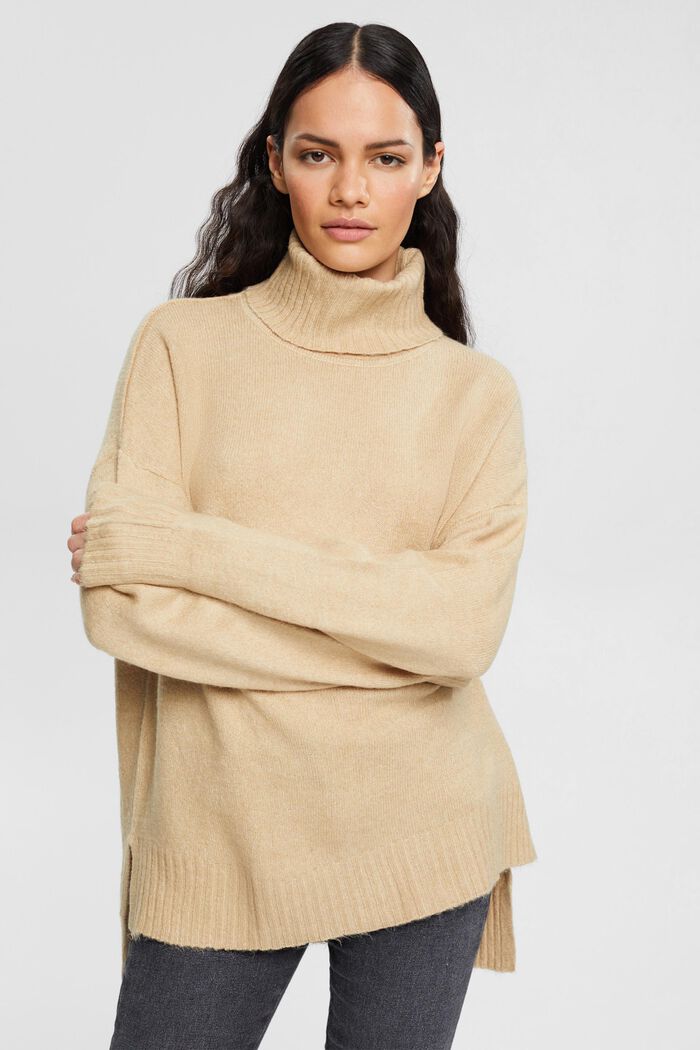 Knitted mouliné roll neck sweater