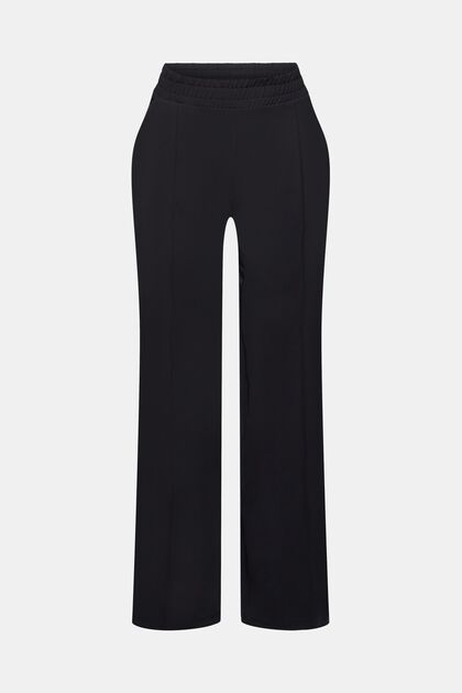 Tracksuit bottoms with E-Dry, BLACK, overview