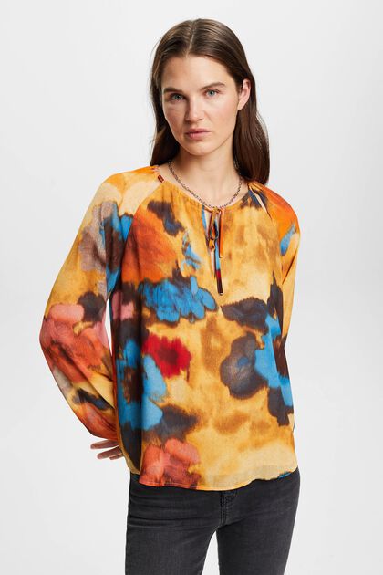 Split-necked top with all-over floral pattern