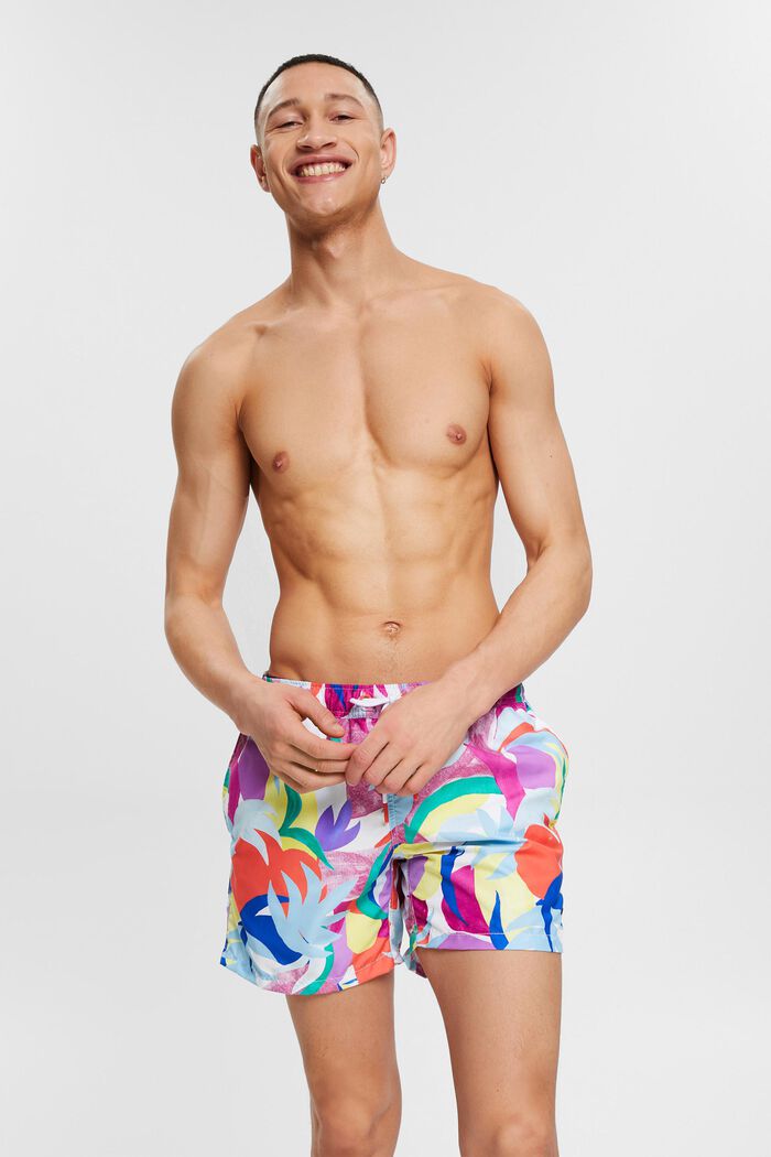 Swim shorts with a colourful pattern