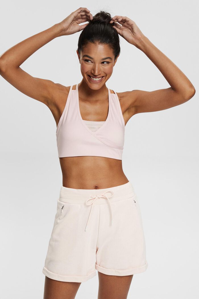 Sports bra in a wrap-over look, made of recycled material
