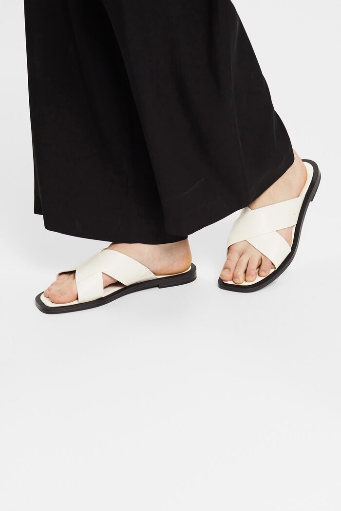 Slip-ons with crossed-over straps